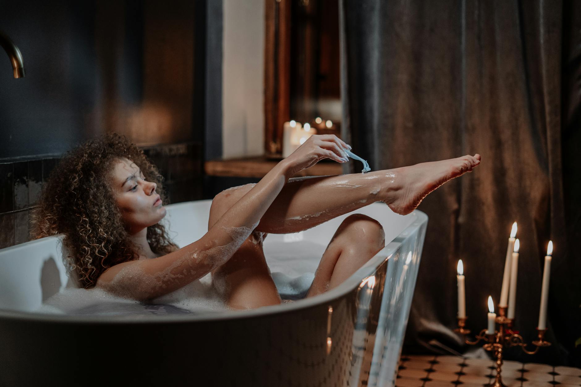 Woman in Bathtub With Water